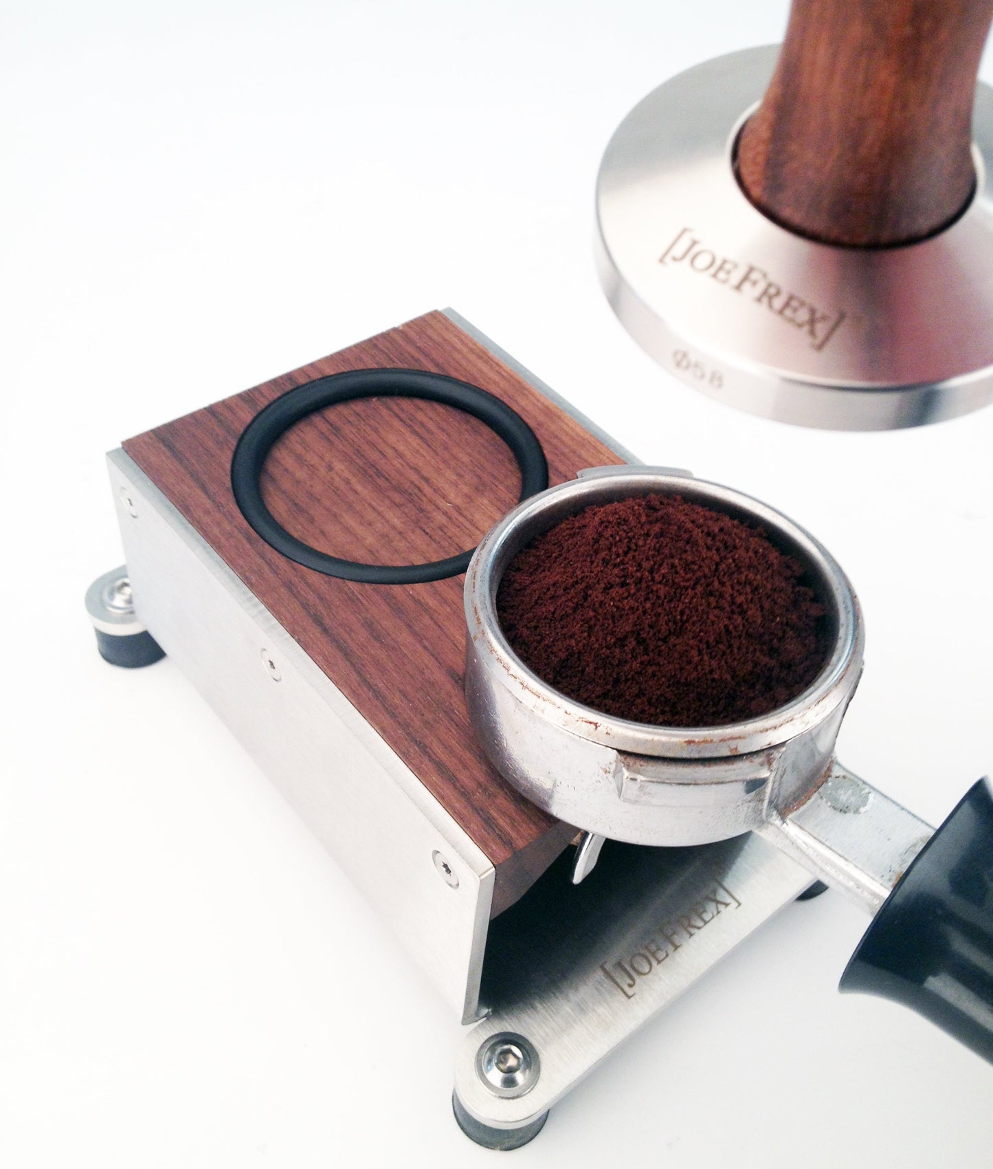 Tamping station walnut is a portafilter holder and a stand for your espresso tamper.  The perfect barista tool.