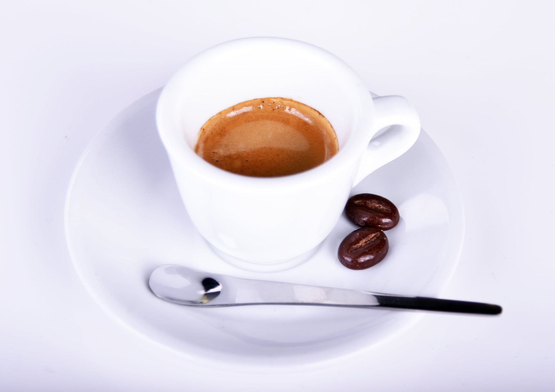 espresso cups and saucers with coffee